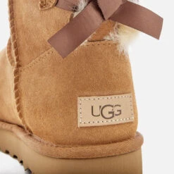 UGG Women's Mini Bailey Bow II Sheepskin Boots - Chestnut 11 UGG Women's Mini Bailey Bow II Sheepskin Boots - Chestnut -Cheap Stepwise Footwear Store 11488816 2714718864128476